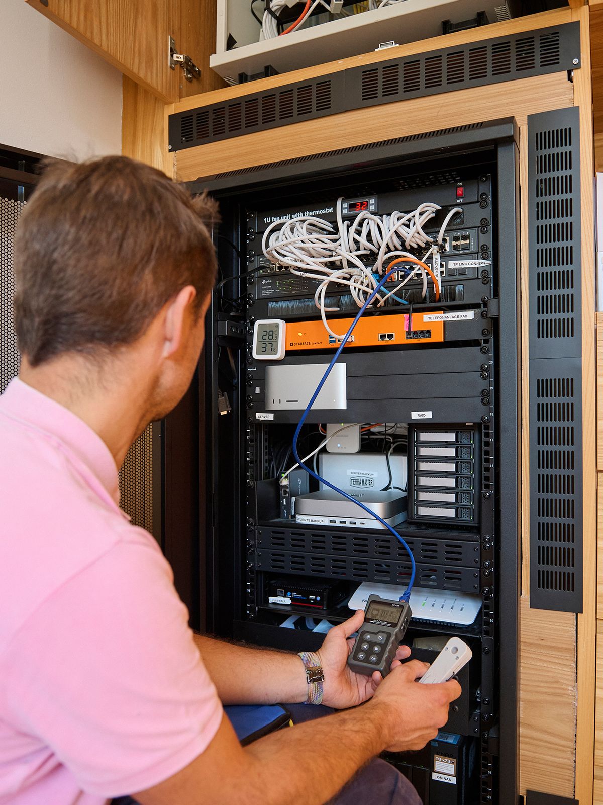 Server cabinet with firewall, server, RAID and phone system